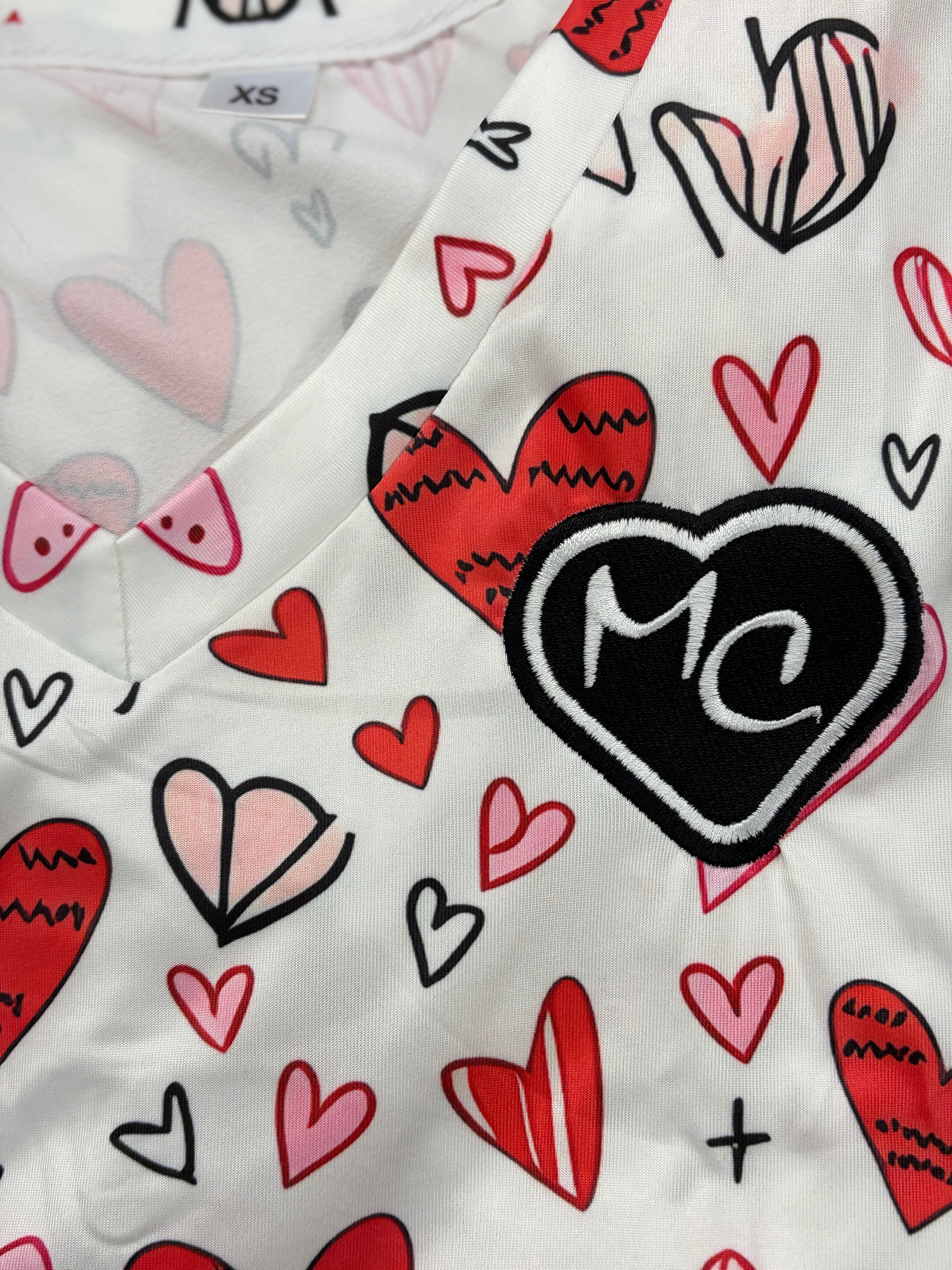 Why bright colours matter in dementia care: The thinking behind heart-pattern scrubs from ScrubsUK.com